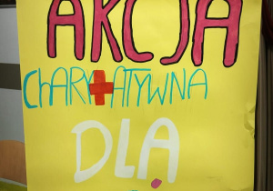 Na plakacie w kolorze zółtym znajduje się napis "Akcja dla Jasia"